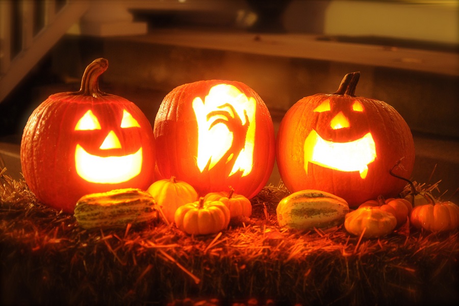 Halloween Virgin Party Drinks Three Jack O Lanterns with Candles Inside Lit