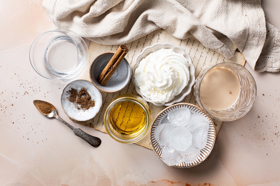 Pumpkin Spice Martini with Baileys Ingredients Laid Out on a Counter