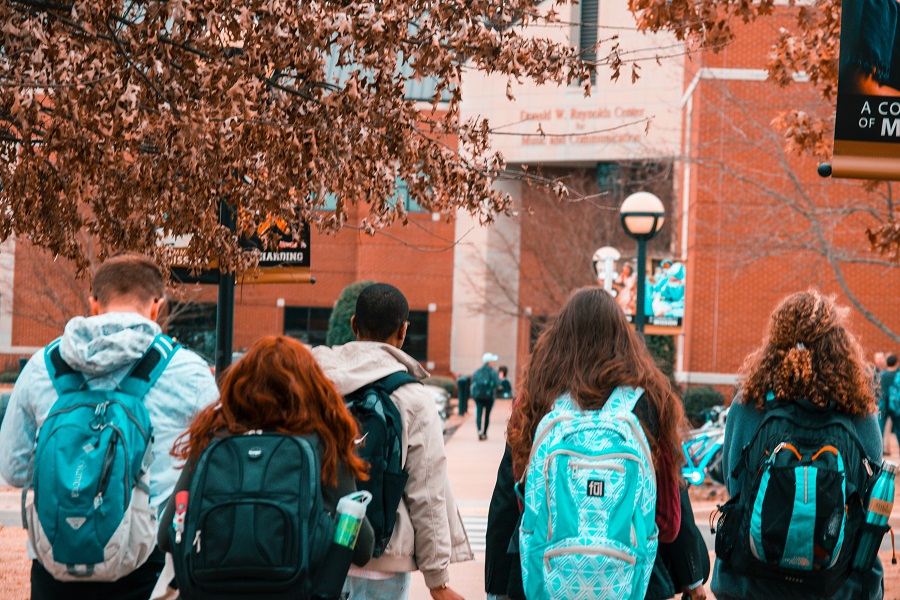 Dorm Room Decor Ideas for Girls in College Students Walking on Campus