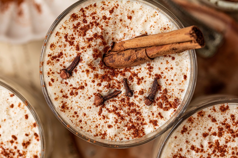 Homemade Spiked Eggnog with Bourbon Recipe Close Up of a Group of Glasses Filled with Eggnog