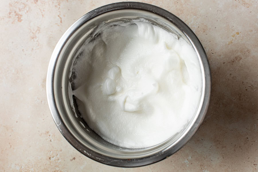 Bourbon Eggnog Recipe Overhead View of a Bowl of Meringue