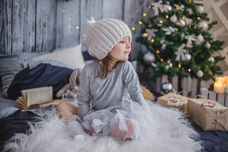DIY Christmas Decor Ideas a Little Girl Waking Up on Christmas Morning with a Christmas Tree Near Her Bed
