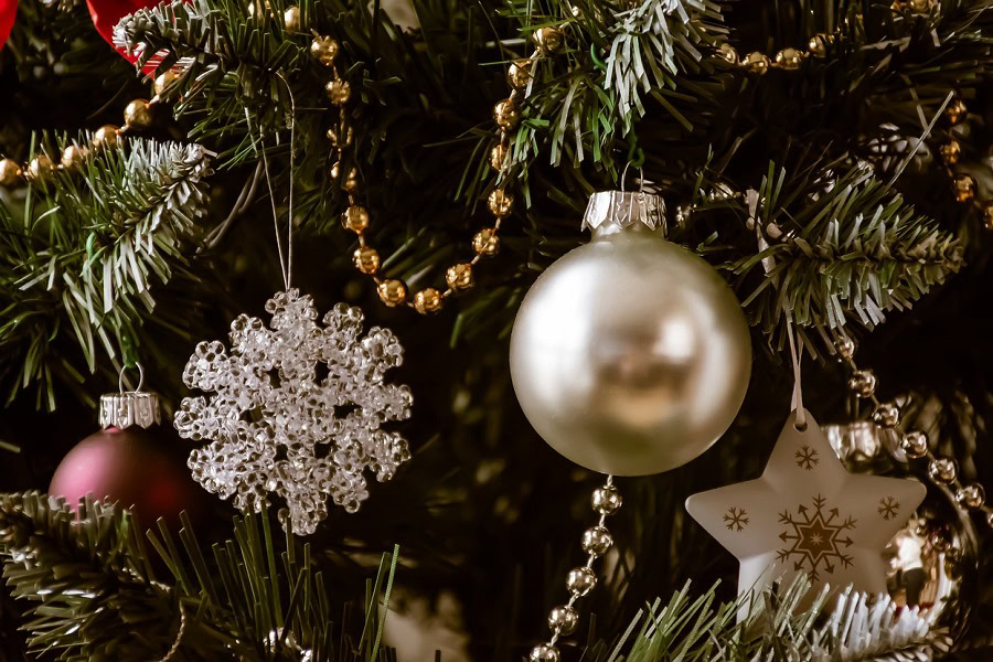 DIY Christmas Tree Ideas Close Up of Silver Ornaments in a Christmas Tree