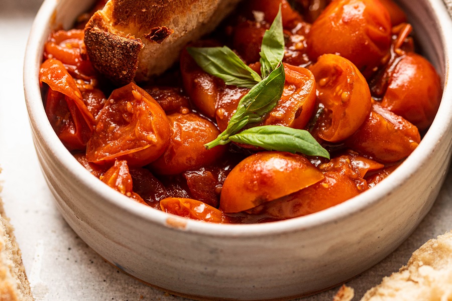 Crostini Bruschetta Appetizer Recipe Close Up of a Bowl of Tomatoes with Bruschetta on Top