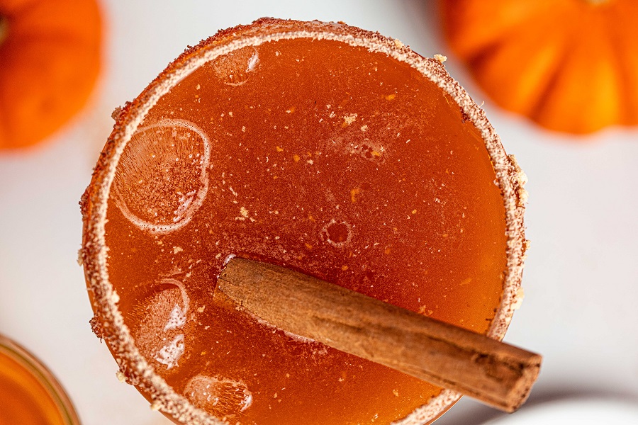 Pumpkin Spice Mocktail Close Up of a Mocktail with a Cinnamon Stick Inside