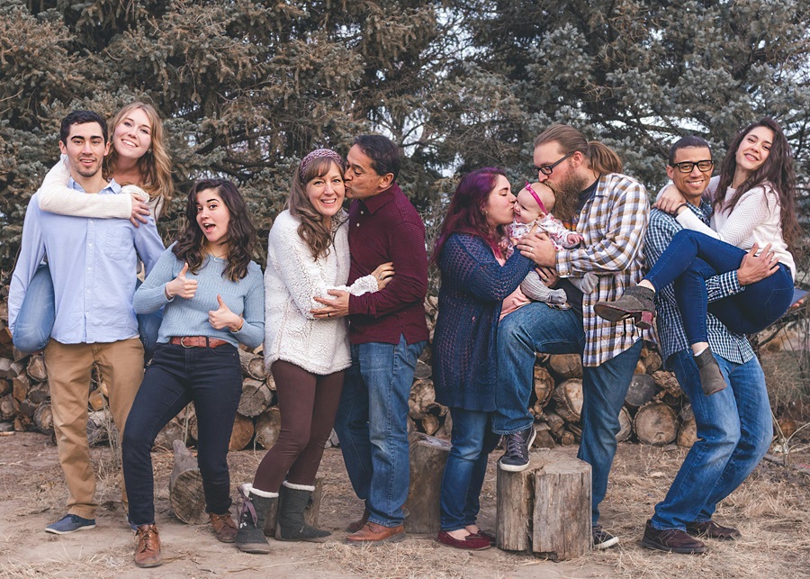 Funny Family Reunion Quotes a Family Portrait with Three Couples Embracing, One Girl, and the Parents in the Middle