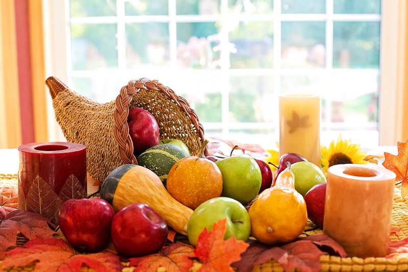 Thanksgiving Letter Board Ideas a Cornucopia Set on a Table in Front of a Window