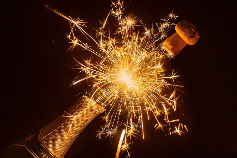 Inspirational Quotes for New Years Eve Close Up of a Champagne Bottle Bursting Open