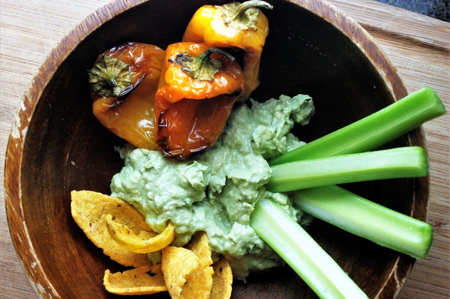 New Years Eve Finger Food Ideas Overhead View of a Bowl of Goat Cheese Guacamole