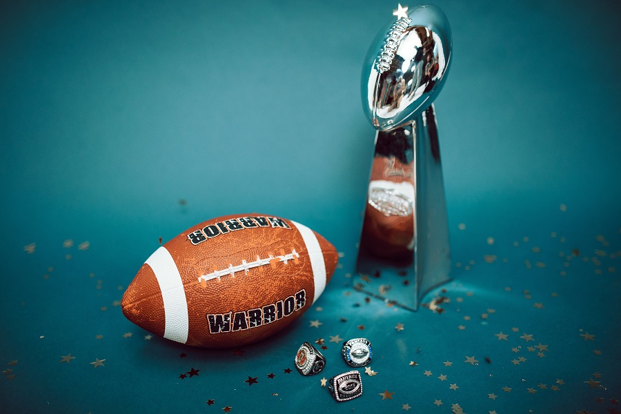 Super Bowl Party Decorations Close Up of a Football with the Vince Lombardi Trophy