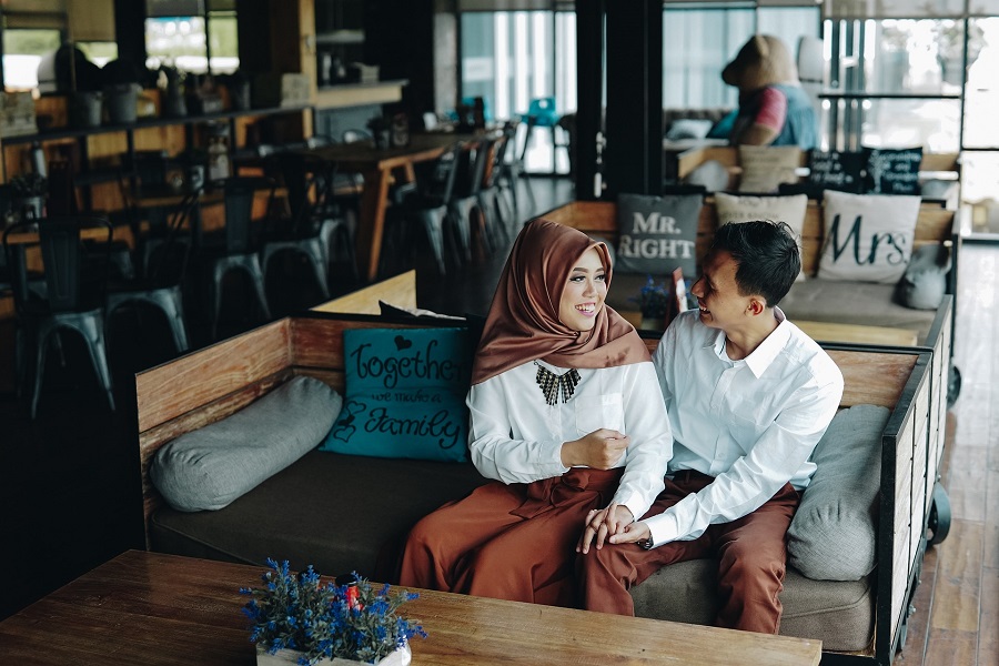 Valentines Photoshoot Ideas Couple Sitting Together in a Coffee Shop