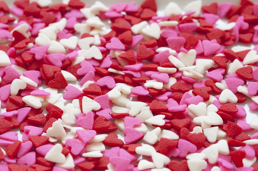 Galentine's Day Quotes Close Up of Heart-Shaped Sprinkled That are Pink, Red, and White