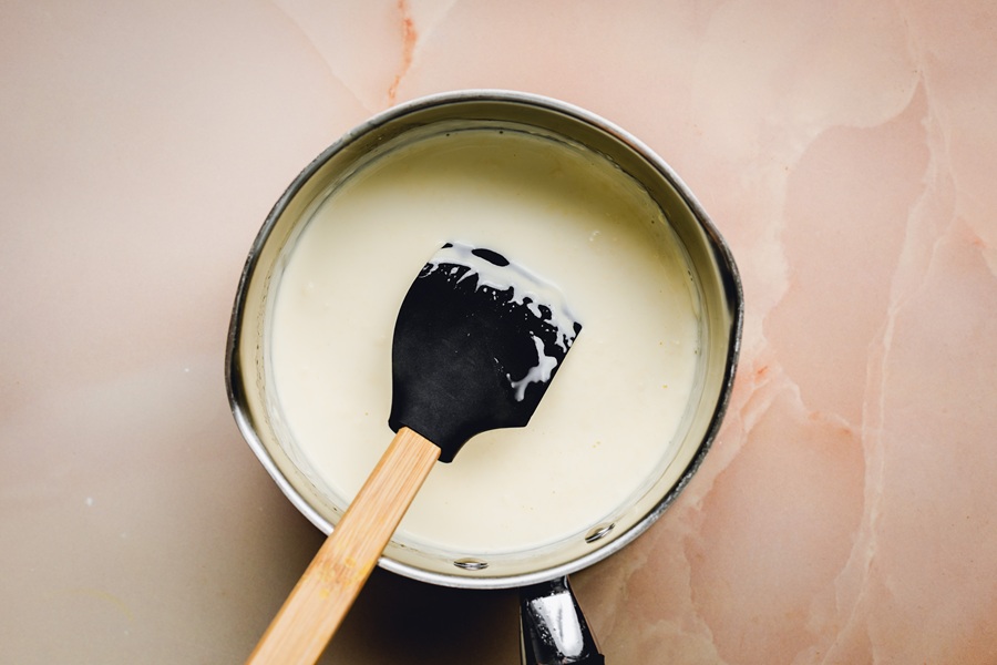 Recipe for Easy Creme Brulee Overhead View of a Pot Filled with Cream Mixture After Cooking