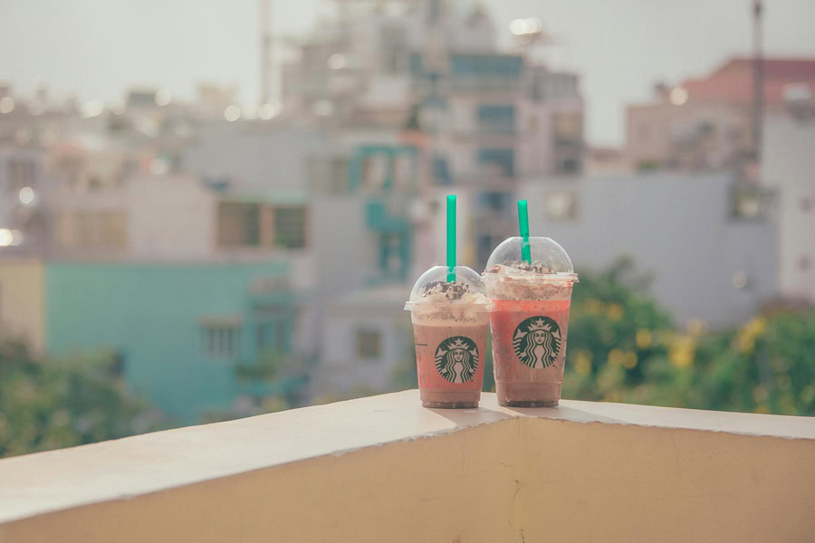 Starbucks Secret Menu Refreshers Drink Recipes Two Starbucks Refreshers Sitting on the Ledge of a Building's Roof