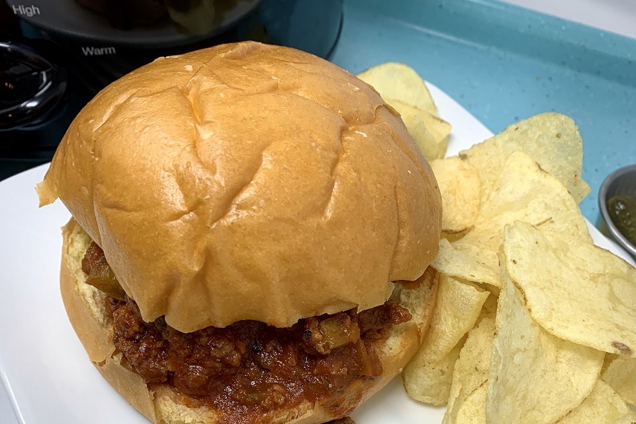 Pool Party Food Ideas Close Up of a Sloppy Joe on a Plate with Chips
