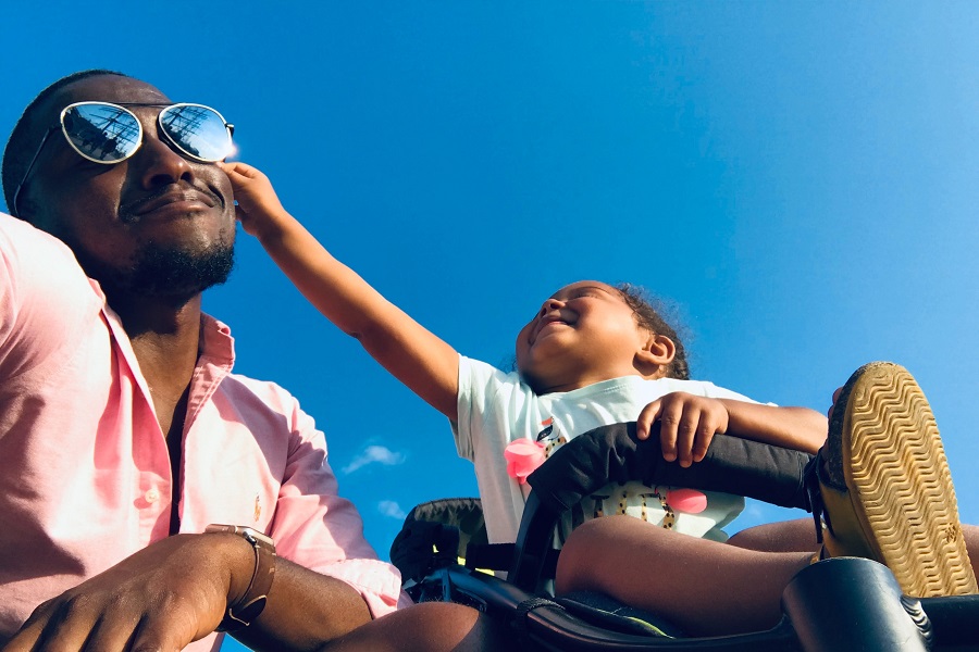 Funny Fathers Day Quotes a Father Playing Outside with His Daughter in a Stroller