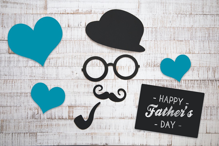 Funny Fathers Day Quotes Paper Hearts, a Paper Bowling Hat, Paper Glasses, and a Paper Mustache Next to a Note That Says Happy Fathers Day
