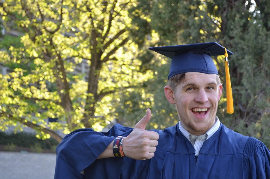 Graduation Gift Ideas a Male Graduate Giving a Thumbs Up 