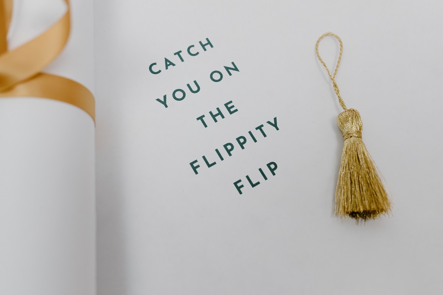 Graduation Party Ideas a Sign That Says Catch You on the Flip Side with a Small Graduation Cap Tassel 