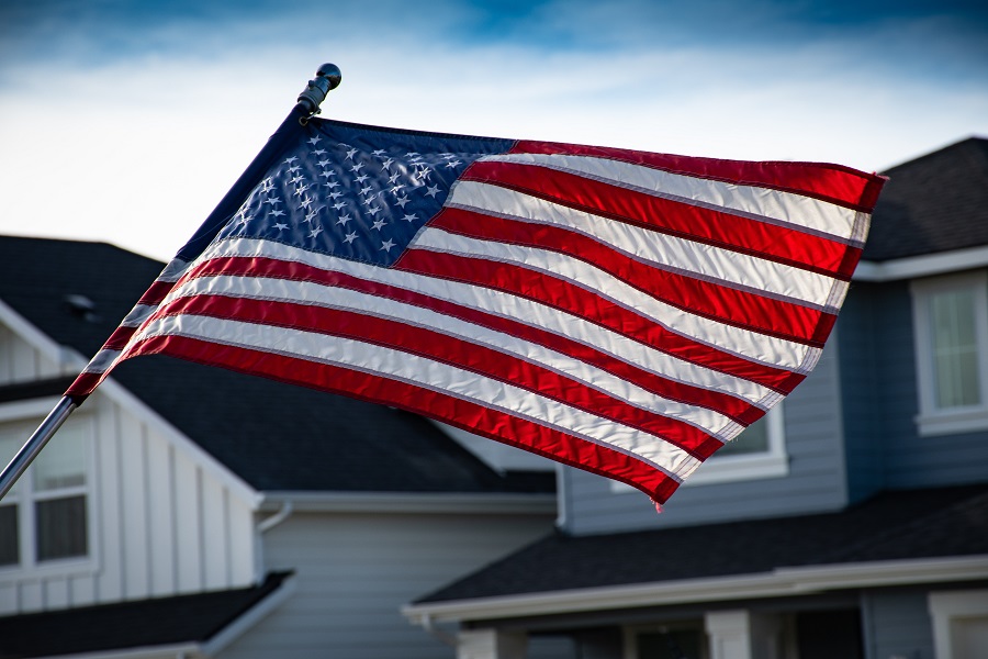 Memorial Day Quotes American Flag Waving Outside a Home