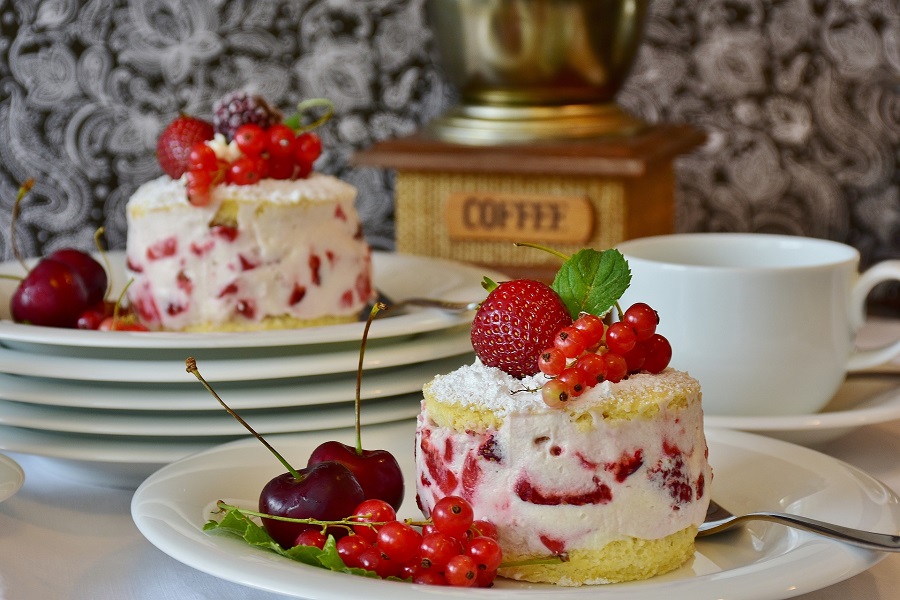 Naked Cake Decorating Ideas Close Up of a Small Naked Cake with Berries on a Plate