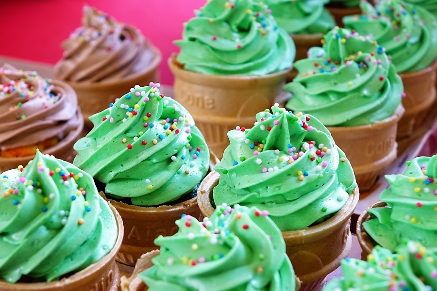 Summer Cupcakes Close Up of Cupcakes with Green Frosting and Some with Chocolate Frosting