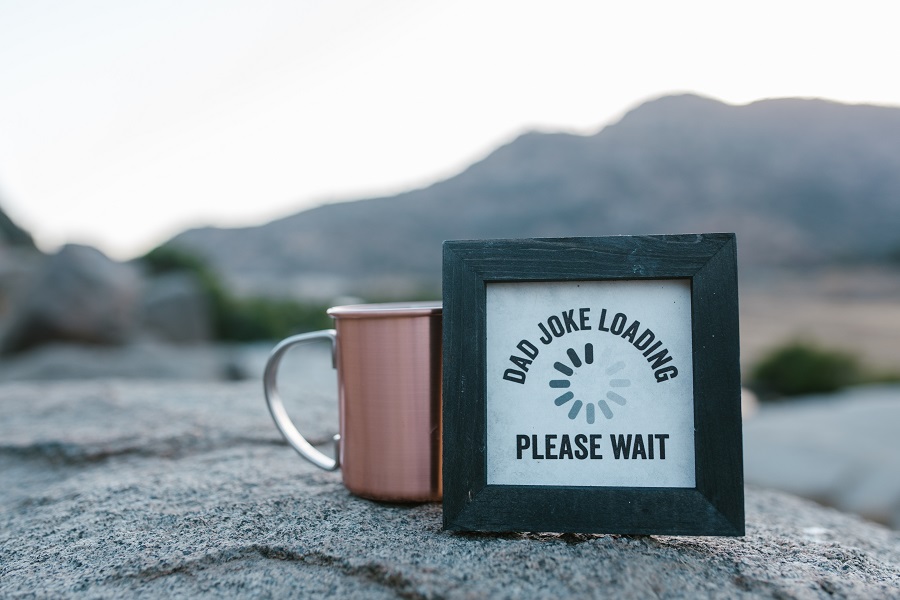 Fathers Day Gift DIYs Close Up of a Sign That Says, "Dad Joke Loading"