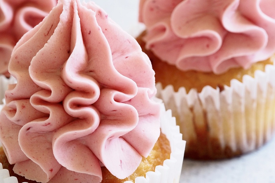 Summer Cupcakes Close Up of Pink Frosting on Vanilla Cupcakes