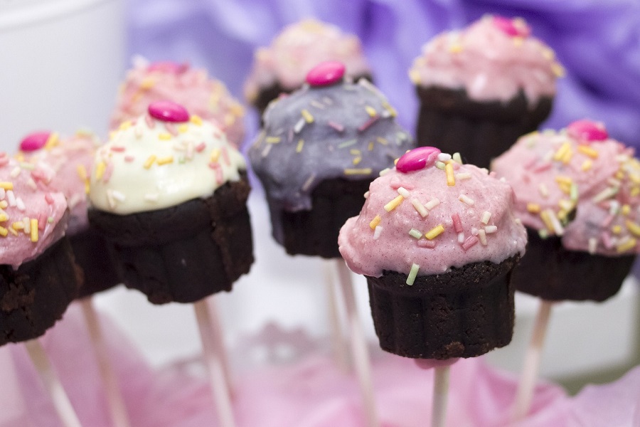 Summer Cupcakes Cupcakes with Pink and Purple Frosting on Popsicle Sticks