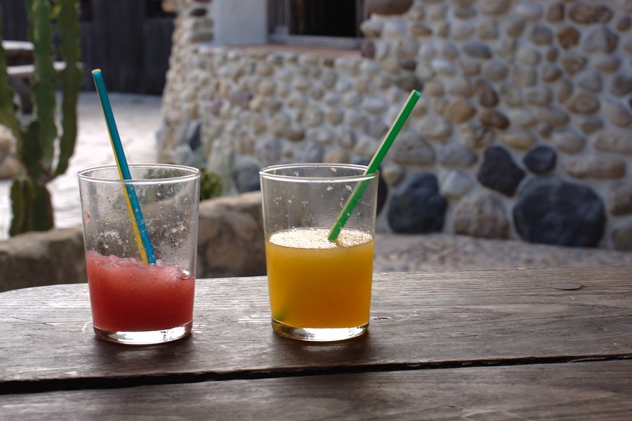 Frozen Cocktails Close Up of Two Frozen Cocktails on a Wooden Table