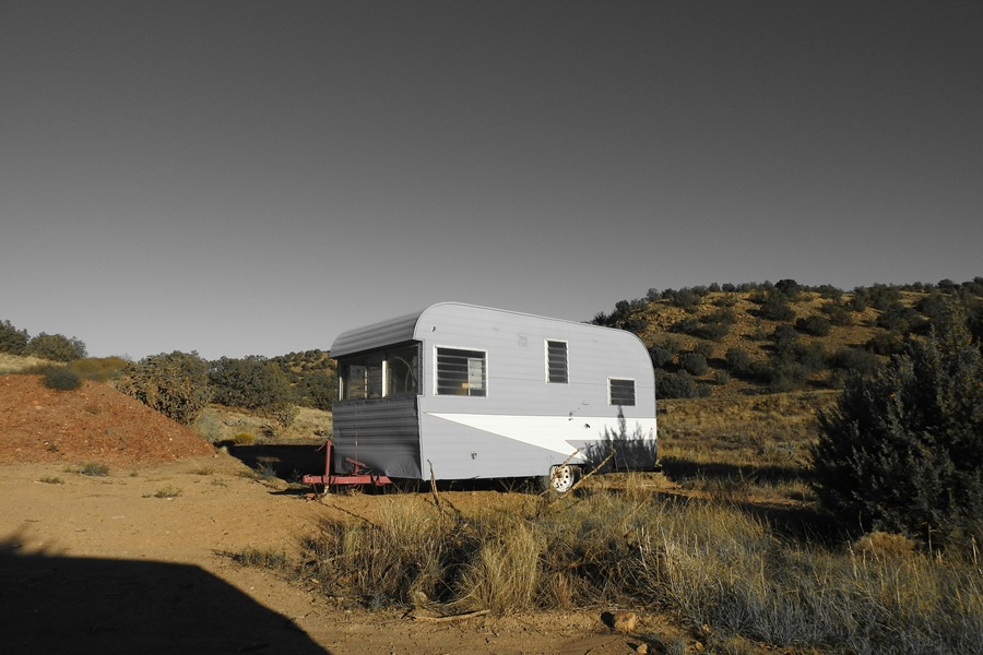 Small Camper Interior Ideas for Travelers a Camper Parked in a Desert
