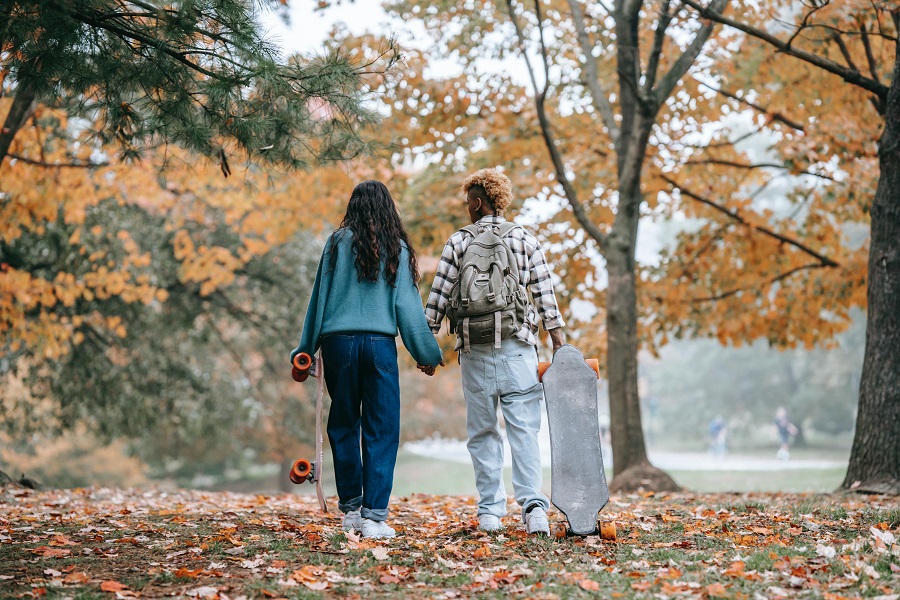 DIY Fall Decor Ideas a Couple Walking Outside During Fall