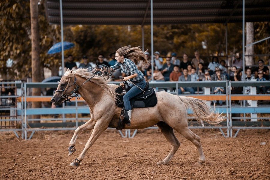 Country Western Nail Designs a Woman Riding a Horse at a Rodeo
