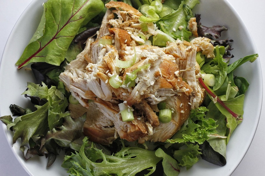 Healthy Teriyaki Chicken Recipe Close Up of Teriyaki Chicken on a Salad in a White Bowl