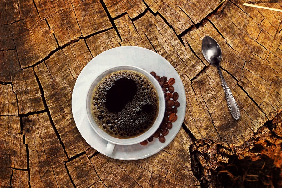 Best Coffee Wine Bar Ideas a Cup of Coffee on a Tree Stump