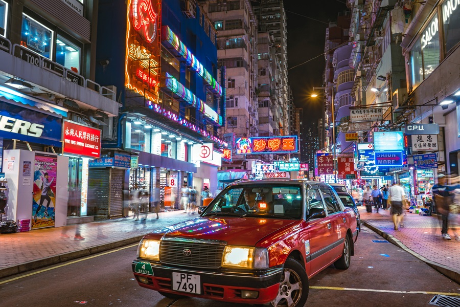 Best Car Movies on Netflix a Car Driving Down a City Street in Hong Kong