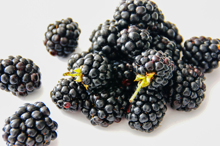 Best Starbucks Refreshers Drinks Close Up of Blackberries on a White Surface