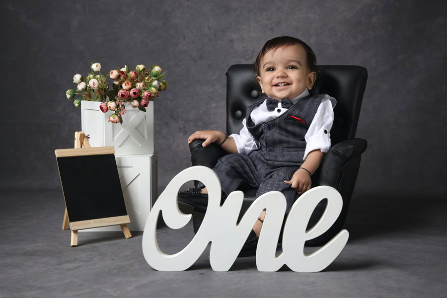 1st Birthday Party Ideas for Boys a Baby Boy in a Portrait Studio Taking First Birthday Pics Dressed as a Mobster