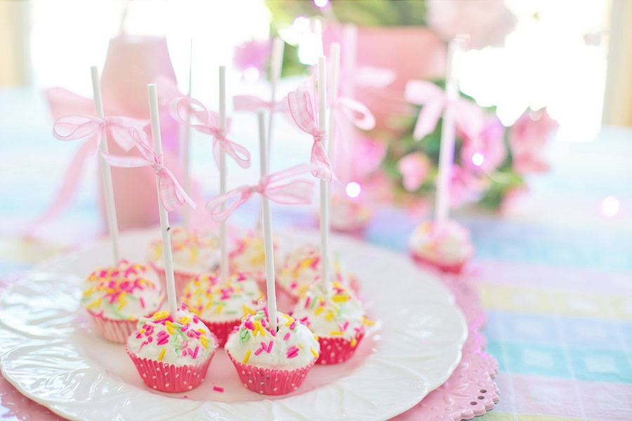 1st Birthday Party Ideas for Girls Close Up of a Serving Tray of Pink Cake Pops