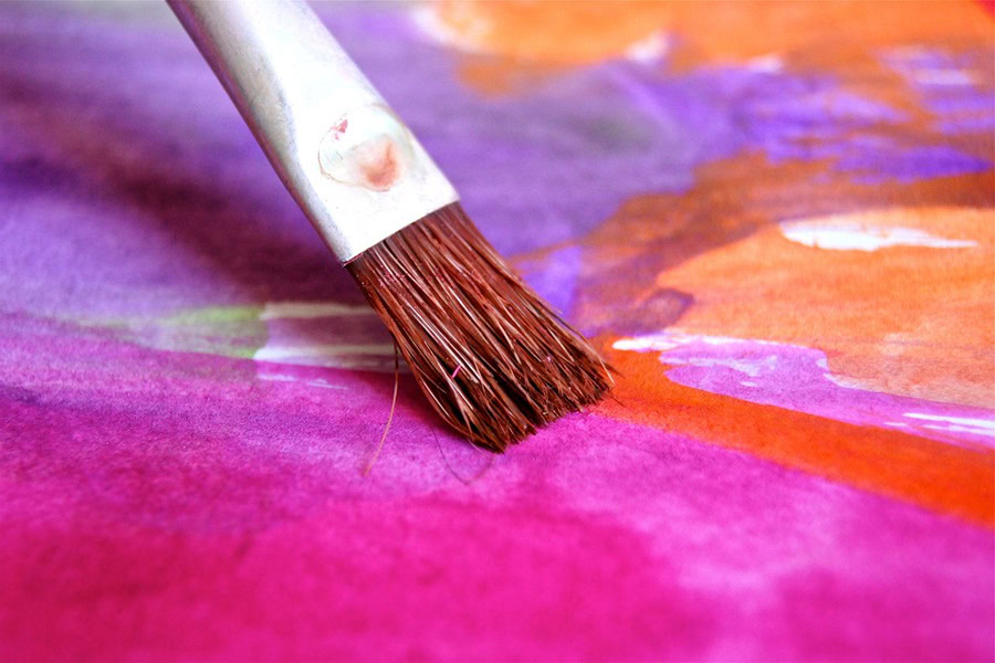 Halloween Crafts for Toddlers Close Up of a Paint Brush with Purple Water Colors on the Paper