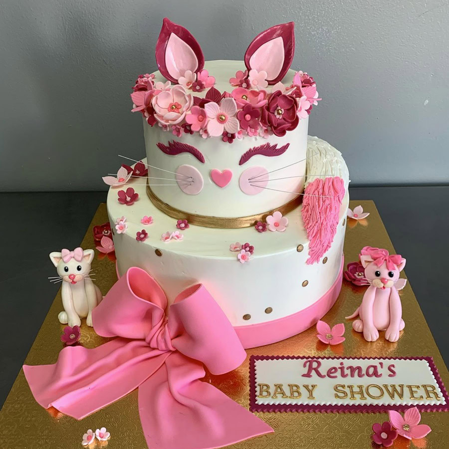 Baby Shower Cakes for Girls a Two-Tiered Cake Decorated Like a Fox