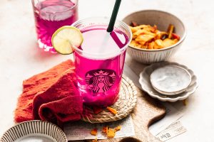 a Starbucks Mango Dragon Fruit Refresher Recipe Next to Small Bowls of Ingredients