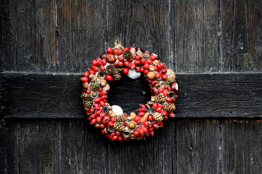 Christmas Party Food for Kids Close Up of a Red Wreath on a Wooden Surface