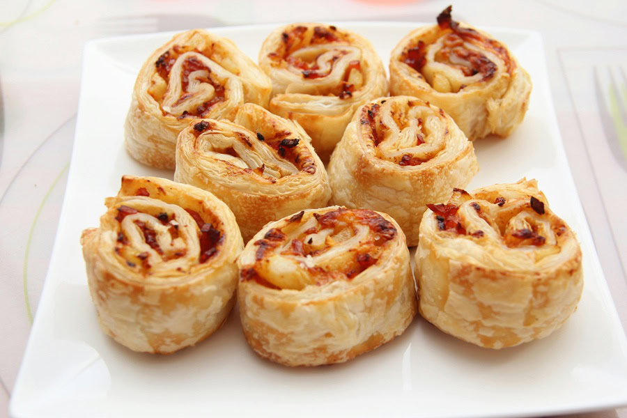 Puff Pastry Appetizer Recipes Close Up of a Serving Tray Filled with Pepperoni Pinwheels