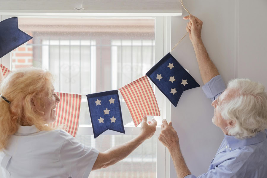 4th of July Cookies an Elderly Couple Hanging American Flag Bunting