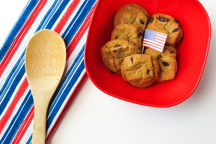 4th of July Cookies a Small Red Bowl of Chocolate Chip Cookies with a Small American Flag on a Toothpick