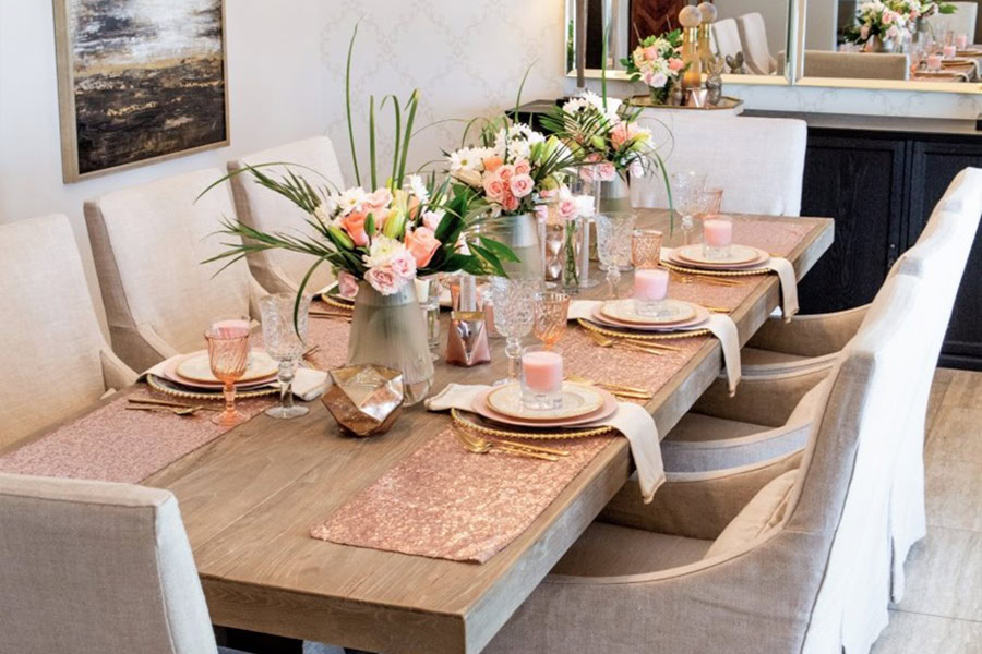 Mother&rsquo;s Day Brunch Decor Ideas a Dining Table with Pink Runners, Flower Centerpieces, and Elegant Chairs