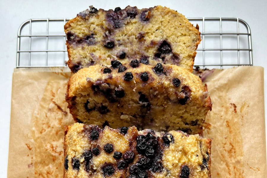 Whole30 Breakfast Recipes a Loaf of Paleo Blueberry Banana Breakfast Bread with a Couple of Slices Laying in Front of it