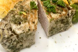 Whole30 Instant Pot Pork Chops Recipe Pork Chops Cut in Half on a Plate