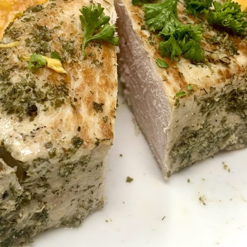 Whole30 Instant Pot Pork Chops Recipe Pork Chops Cut in Half on a Plate